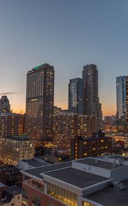 Preview wallpaper city, evening, lights, buildings