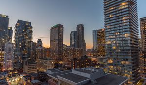 Preview wallpaper city, evening, lights, buildings
