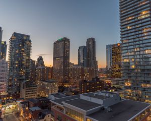 Preview wallpaper city, evening, lights, buildings