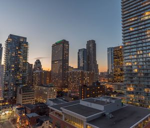 Preview wallpaper city, evening, lights, buildings