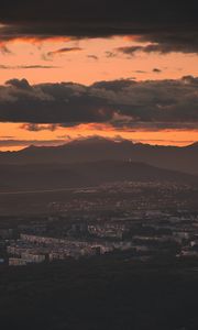 Preview wallpaper city, evening, mountains, sunset