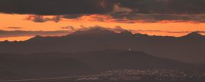 Preview wallpaper city, evening, mountains, sunset