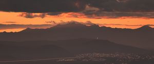 Preview wallpaper city, evening, mountains, sunset