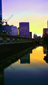 Preview wallpaper city, evening, river, buildings