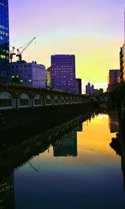 Preview wallpaper city, evening, river, buildings