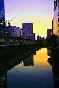 Preview wallpaper city, evening, river, buildings