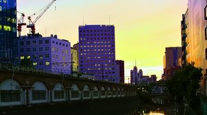 Preview wallpaper city, evening, river, buildings