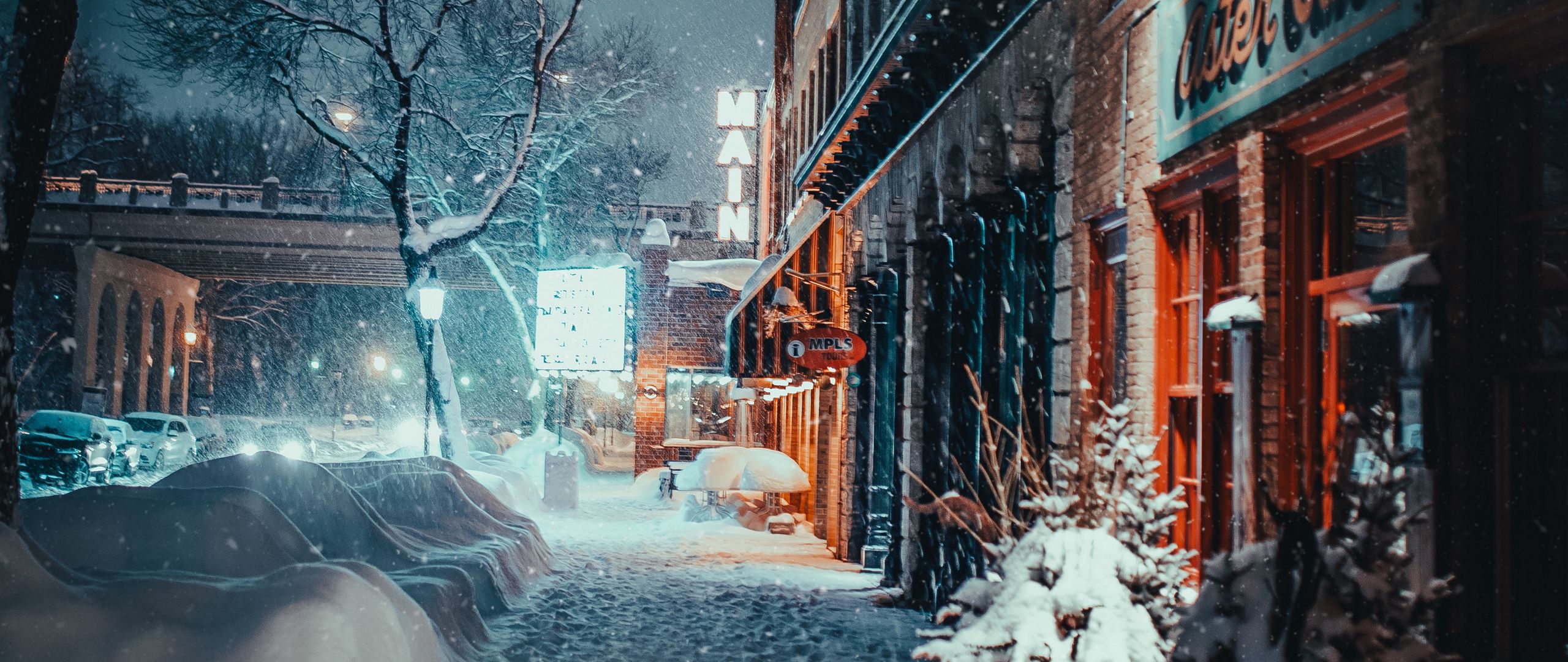 Download wallpaper 2560x1080 city, evening, snowfall, winter, street ...
