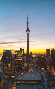 Preview wallpaper city, evening, tower, buildings, sunset