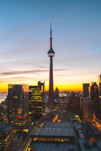 Preview wallpaper city, evening, tower, buildings, sunset