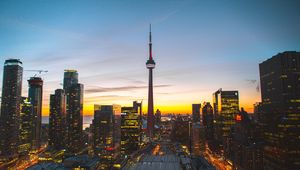Preview wallpaper city, evening, tower, buildings, sunset