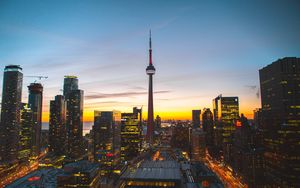 Preview wallpaper city, evening, tower, buildings, sunset