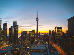 Preview wallpaper city, evening, tower, buildings, sunset