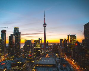 Preview wallpaper city, evening, tower, buildings, sunset