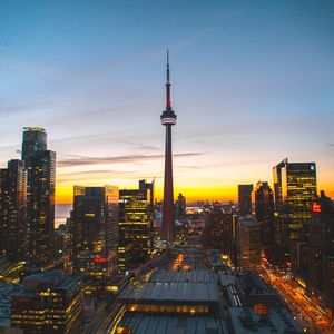 Preview wallpaper city, evening, tower, buildings, sunset