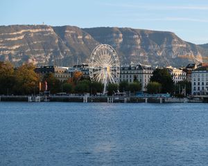 Preview wallpaper city, ferris wheel, coast, mountain, buildings