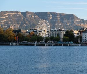 Preview wallpaper city, ferris wheel, coast, mountain, buildings