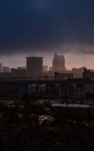 Preview wallpaper city, fog, buildings, bridge, gloom