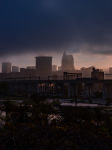 Preview wallpaper city, fog, buildings, bridge, gloom