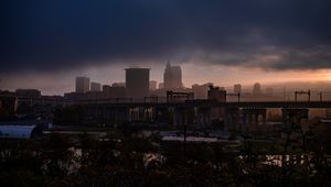 Preview wallpaper city, fog, buildings, bridge, gloom