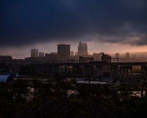 Preview wallpaper city, fog, buildings, bridge, gloom