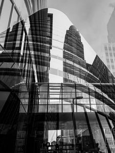 Preview wallpaper city, glass, reflection, street, windows, edges, bw