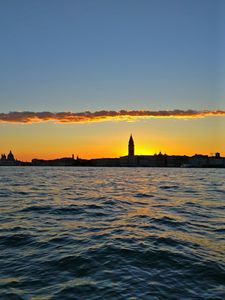 Preview wallpaper city, horizon, dawn, water, ripples