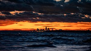 Preview wallpaper city, horizon, sunset, sea, waves