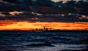 Preview wallpaper city, horizon, sunset, sea, waves