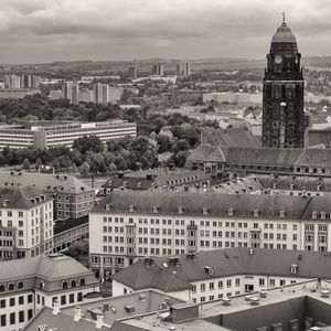 Preview wallpaper city, houses, buildings, tower, clock, black and white