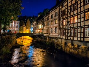Preview wallpaper city, houses, buildings, bridge, river, night