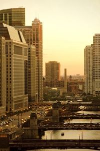 Preview wallpaper city, houses, sky, skyscrapers, bridges