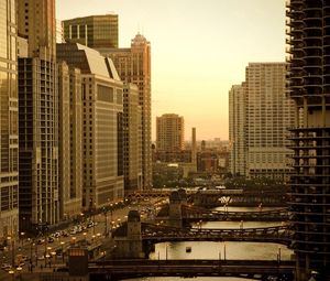 Preview wallpaper city, houses, sky, skyscrapers, bridges