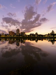 Preview wallpaper city, lake, shore, buildings, water, reflection