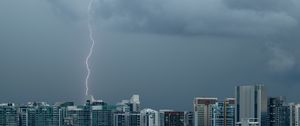 Preview wallpaper city, lightning, buildings, sky