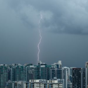 Preview wallpaper city, lightning, buildings, sky