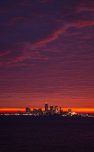 Preview wallpaper city, lights, sea, sunset, dark