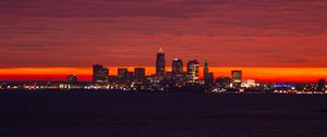 Preview wallpaper city, lights, sea, sunset, dark