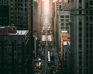 Preview wallpaper city, metropolis, aerial view, buildings, road
