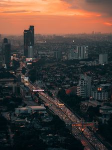 Preview wallpaper city, metropolis, aerial view, buildings, road