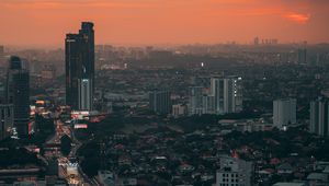 Preview wallpaper city, metropolis, aerial view, buildings, road