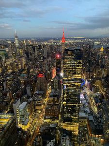 Preview wallpaper city, metropolis, aerial view, buildings, lights, twilight