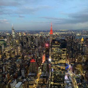 Preview wallpaper city, metropolis, aerial view, buildings, lights, twilight