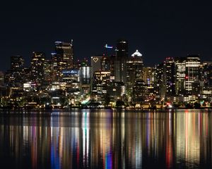 Preview wallpaper city, metropolis, buildings, coast, night, reflection