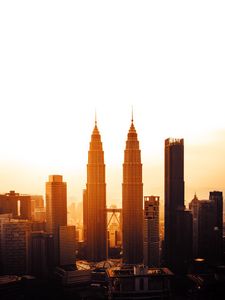 Preview wallpaper city, metropolis, sunset, towers