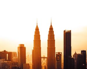 Preview wallpaper city, metropolis, sunset, towers