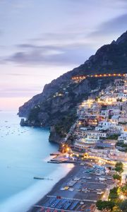 Preview wallpaper city, mountain, coast, buildings, beach