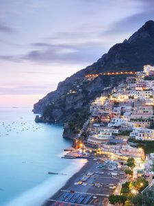 Preview wallpaper city, mountain, coast, buildings, beach
