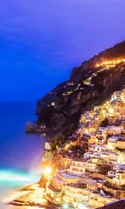 Preview wallpaper city, mountain, light, sea, twilight, evening