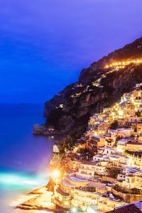 Preview wallpaper city, mountain, light, sea, twilight, evening